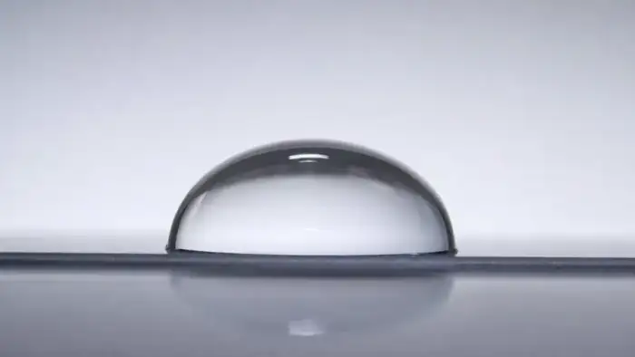 Sessile droplet on a flat coated surface for contact angle measurement