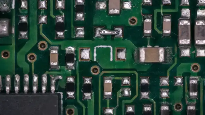 PCB inspection close-up with components and solder features