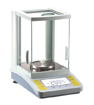 Weighing of capsules and pills in precision scales of medicine and liquid  pharmaceutical products in laboratory